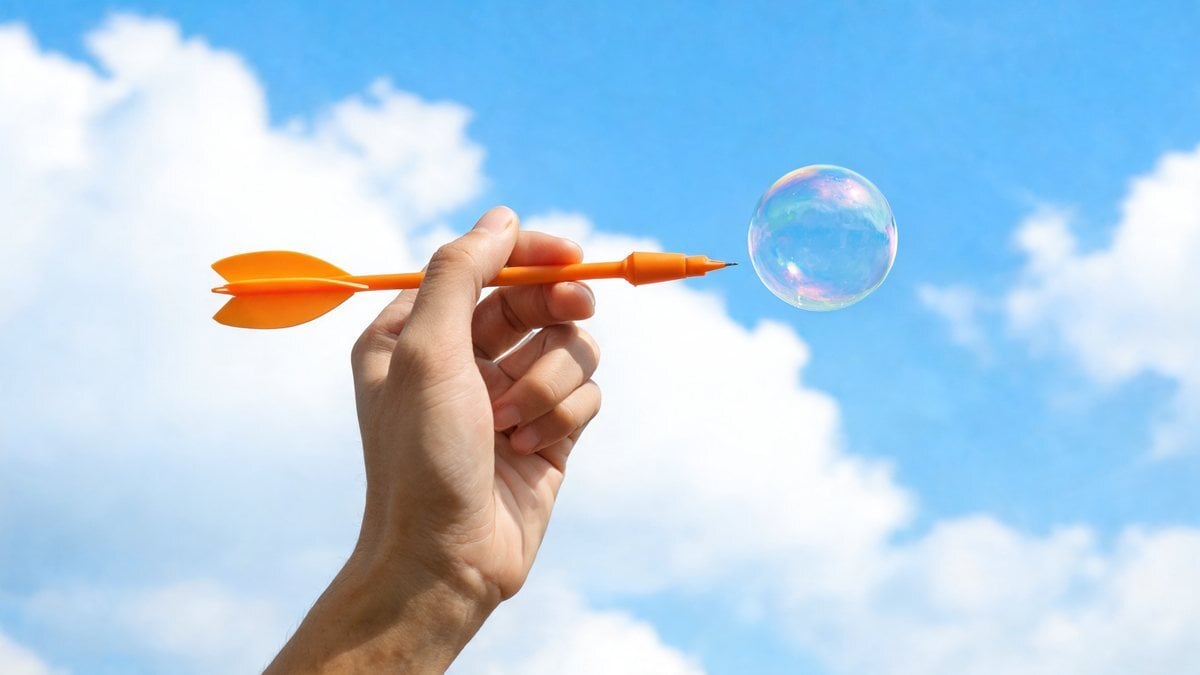 A hand aiming a dart at a soap bubble against a blue sky